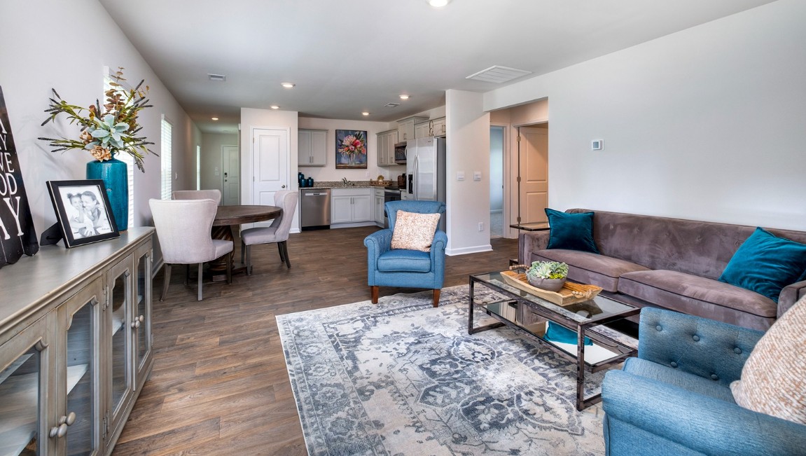 This appealing one-story layout optimizes living space with an open concept kitchen situated in between the living room and dining room and all bedrooms upstairs