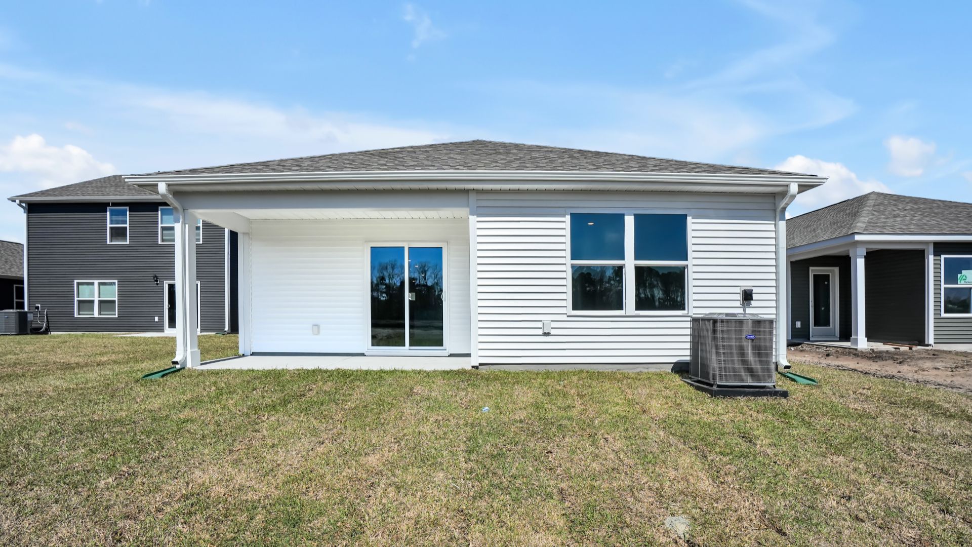 Enjoy the covered porch perfect for entertaining and enjoying the Carolina evenings.