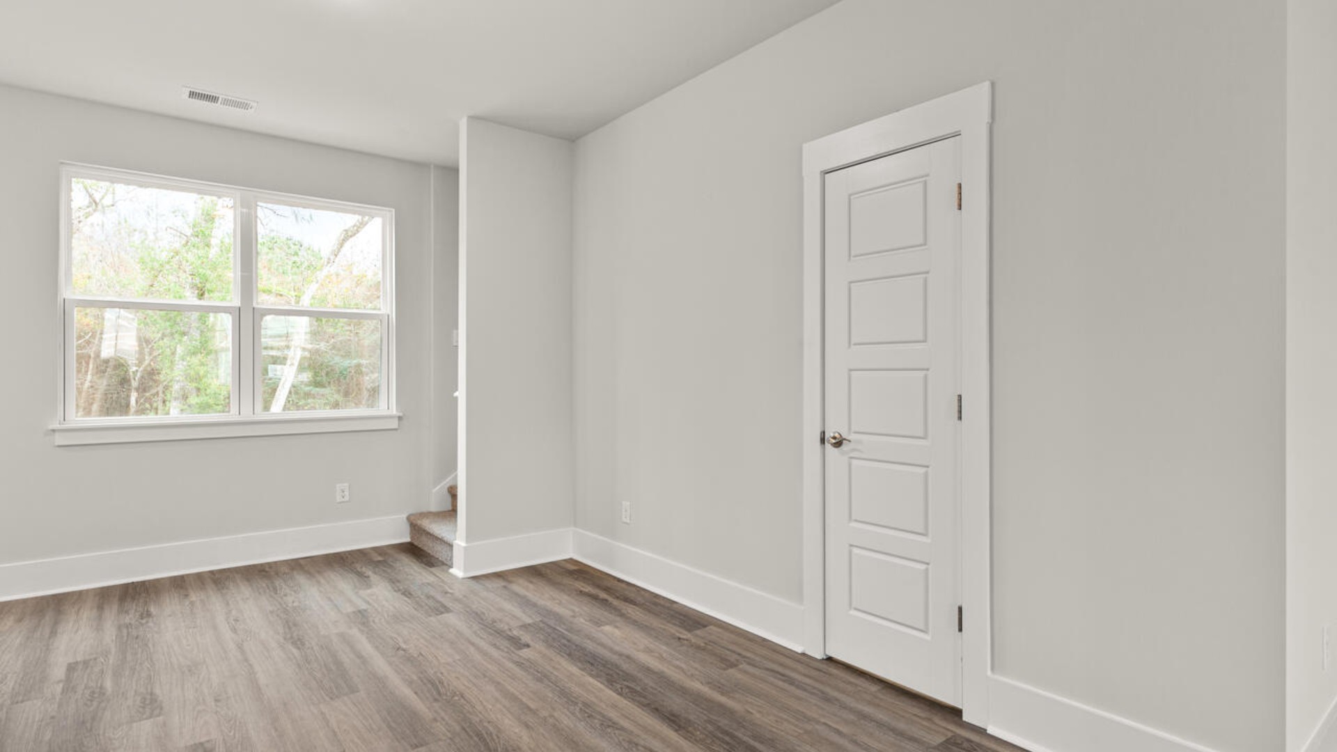 Entering the home we find a large family room and dining area that's perfect for entertaining. The heart of the home is the kitchen features granite counters, stainless-steel appliances and a large peninsula island with room for 4 counter height barstools.