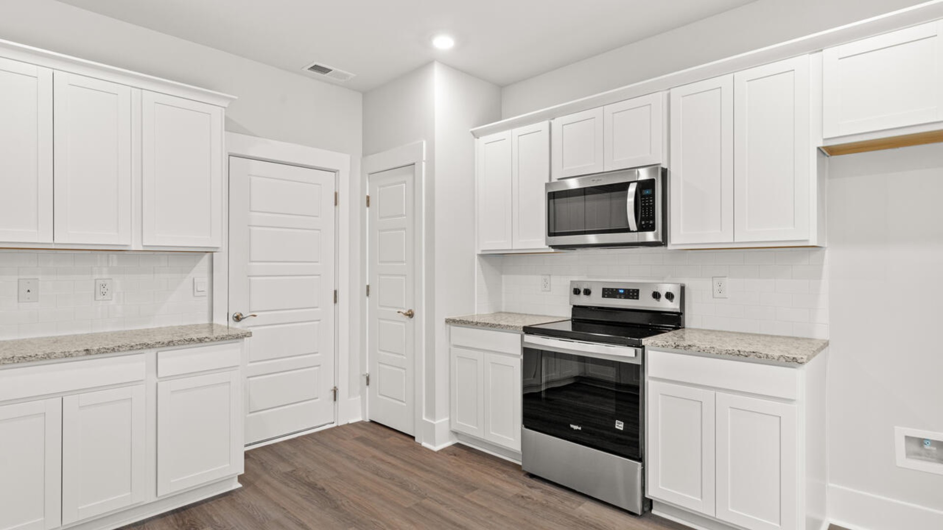 Entering the home we find a large family room and dining area that's perfect for entertaining. The heart of the home is the kitchen features granite counters, stainless-steel appliances and a large peninsula island with room for 4 counter height barstools.