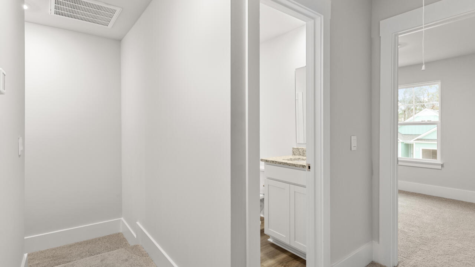 The primary bedroom has its own attached bathroom that features a walk-in closet and all the space you need to get ready in the morning.