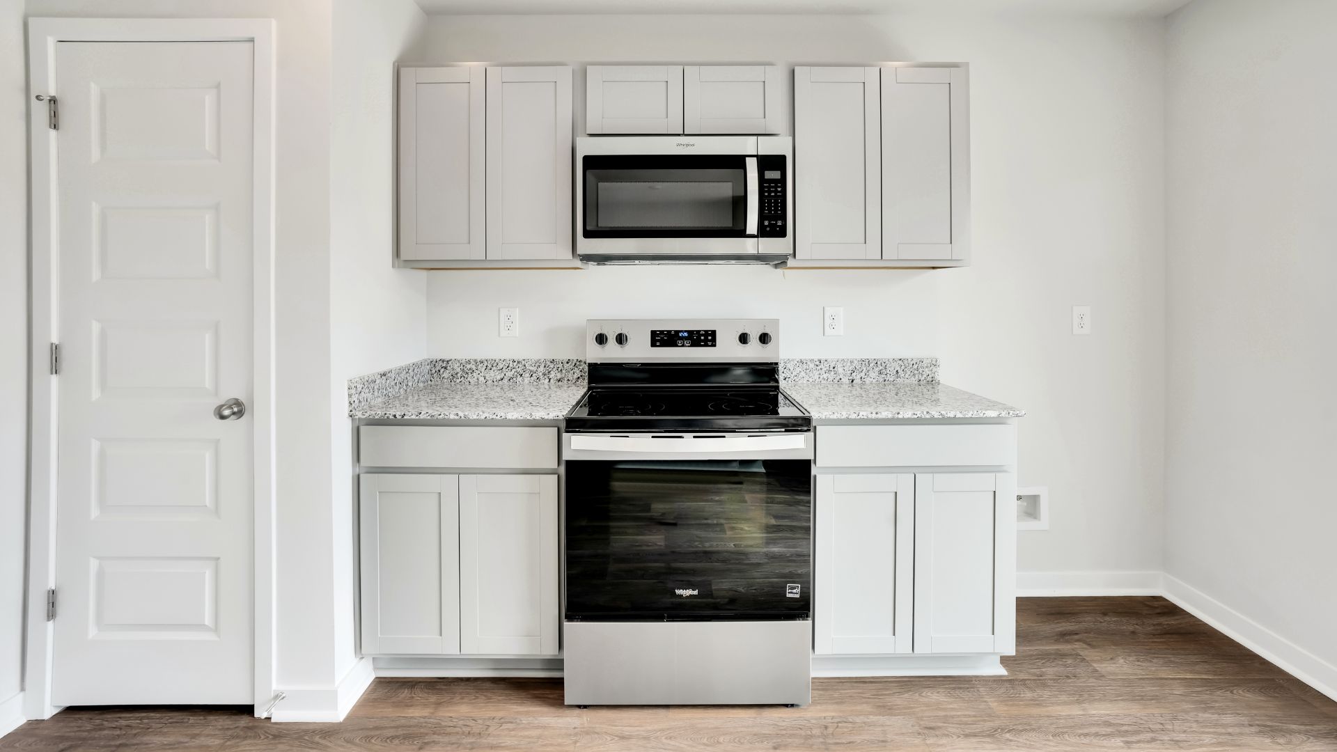 Entering the home we find a large family room and dining area that's perfect for entertaining. The heart of the home is the kitchen features granite counters, stainless-steel appliances and a large peninsula island with room for 4 counter height barstools.