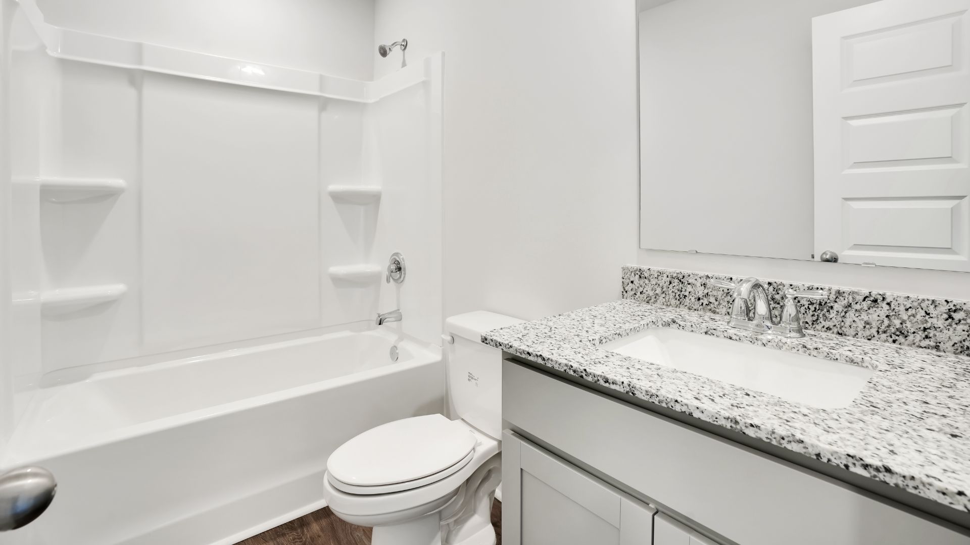 The primary bedroom has its own attached bathroom that features a walk-in closet and all the space you need to get ready in the morning.