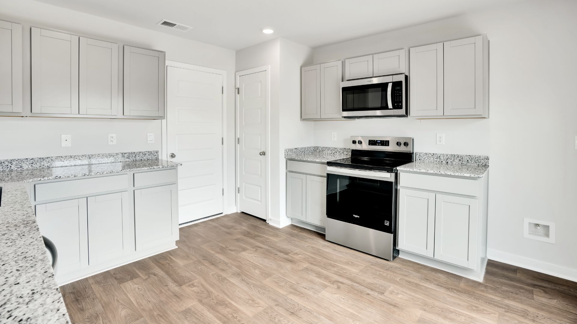 Entering the home we find a large family room and dining area that's perfect for entertaining. The heart of the home is the kitchen features granite counters, stainless-steel appliances and a large peninsula island with room for 4 counter height barstools.