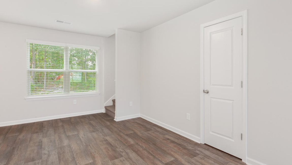 Entering the home we find a large family room and dining area that's perfect for entertaining. The heart of the home is the kitchen features granite counters, stainless-steel appliances and a large peninsula island with room for 4 counter height barstools.