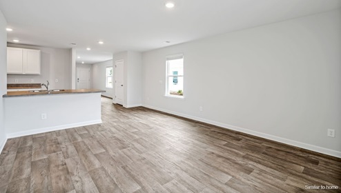 Inside this 3 bedroom, 2 bathroom home, you’ll find 1,459 square feet of comfortable living. This one-story concrete block constructed home is meticulously designed to optimize living space through an open-concept layout.
