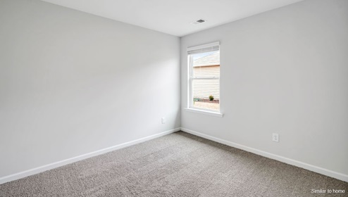 The primary bedroom features an ensuite bathroom with a double vanity, granite countertops, and walk-in closet . Each bedroom has carpeted floors along with a closet that are versatile to fit your family's needs, whether they become bedrooms or home offices.