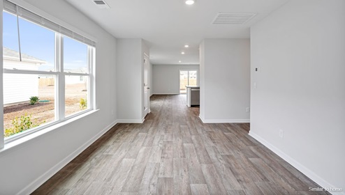 Inside this 3 bedroom, 2 bathroom home, you’ll find 1,459 square feet of comfortable living. This one-story concrete block constructed home is meticulously designed to optimize living space through an open-concept layout.