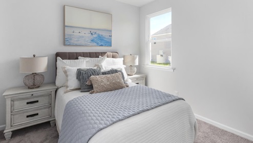 The primary bedroom features an ensuite bathroom with a double vanity, granite countertops, and walk-in closet . Each bedroom has carpeted floors along with a closet that are versatile to fit your family's needs, whether they become bedrooms or home offices.