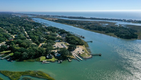 ituated in the heart of South Brunswick County, this rapidly expanding area lies just south of Wilmington, drawing people who appreciate a rural small-town vibe. Renowned for its stunning beaches, the region is a haven for water sports enthusiasts. Boaters can reach Sunset Harbor Boat Ramp in just 6 minutes.