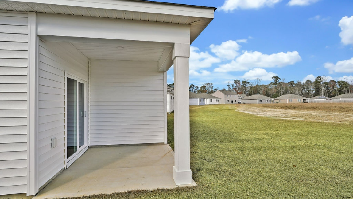 Enjoy the covered porch perfect for entertaining and enjoying the Carolina evenings.
