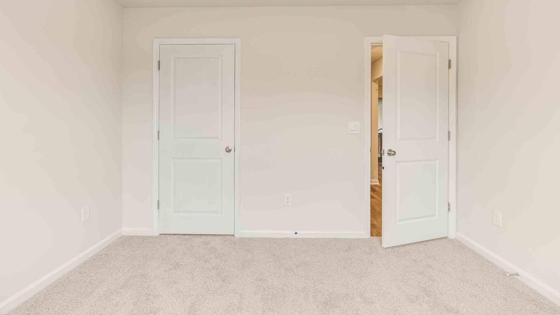 there are another 2 bedrooms and full bath. In every bedroom you’ll have carpeted floors and a closet in each room.