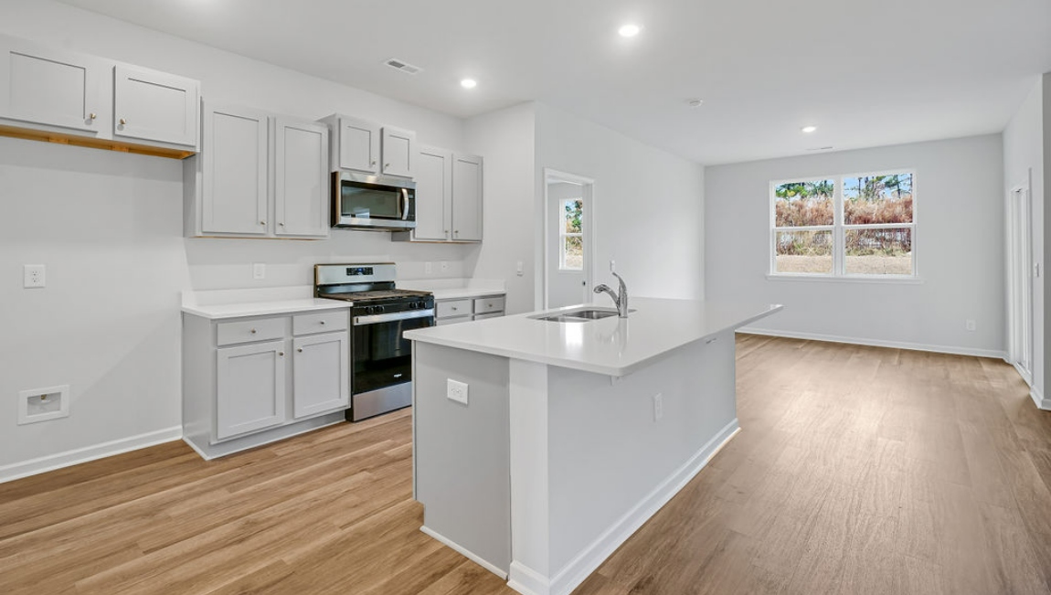 Kitchen has oversized kitchen Island for entertaining, Stainless Steel Appliances, large pantry and much more