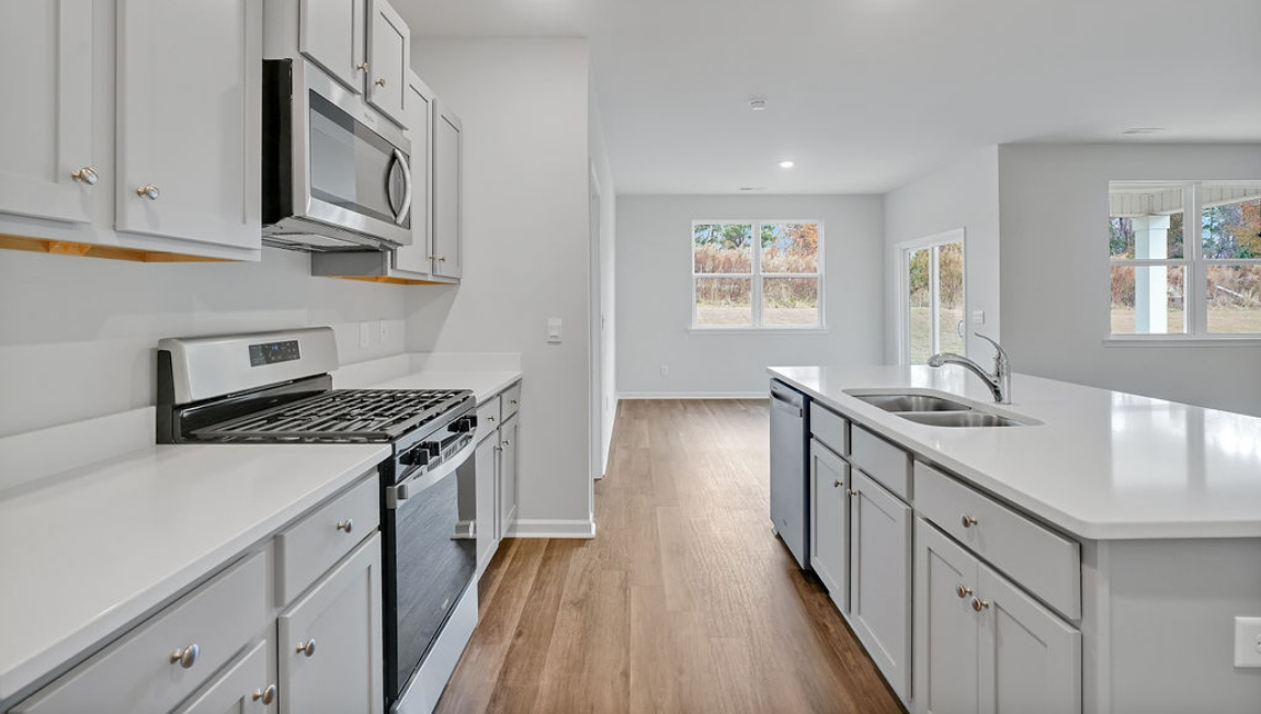 Kitchen has oversized kitchen Island for entertaining, Stainless Steel Appliances, large pantry and much more