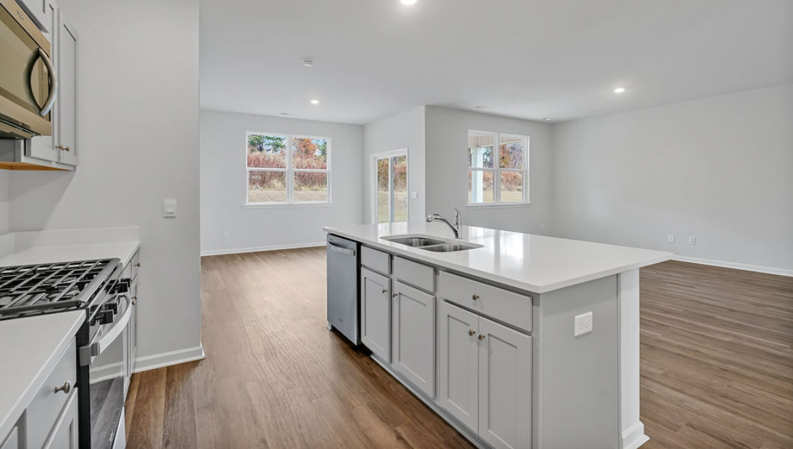 Kitchen has oversized kitchen Island for entertaining, Stainless Steel Appliances, large pantry and much more