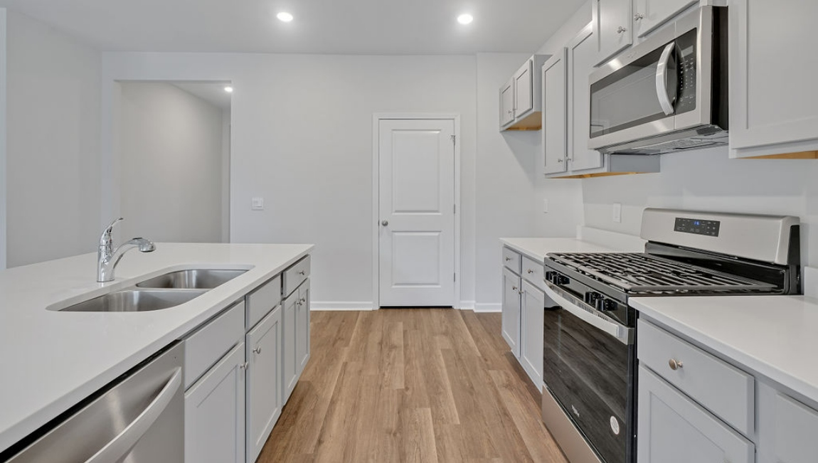 Kitchen has oversized kitchen Island for entertaining, Stainless Steel Appliances, large pantry and much more