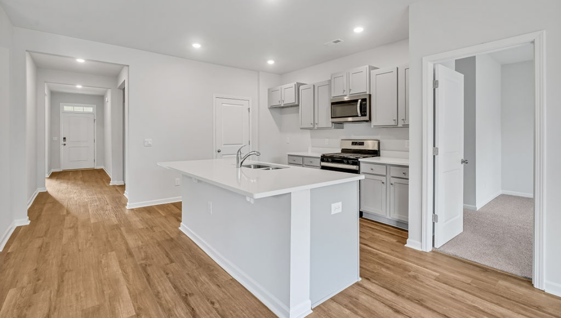 Kitchen has oversized kitchen Island for entertaining, Stainless Steel Appliances, large pantry and much more