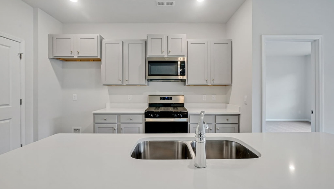 Kitchen has oversized kitchen Island for entertaining, Stainless Steel Appliances, large pantry and much more