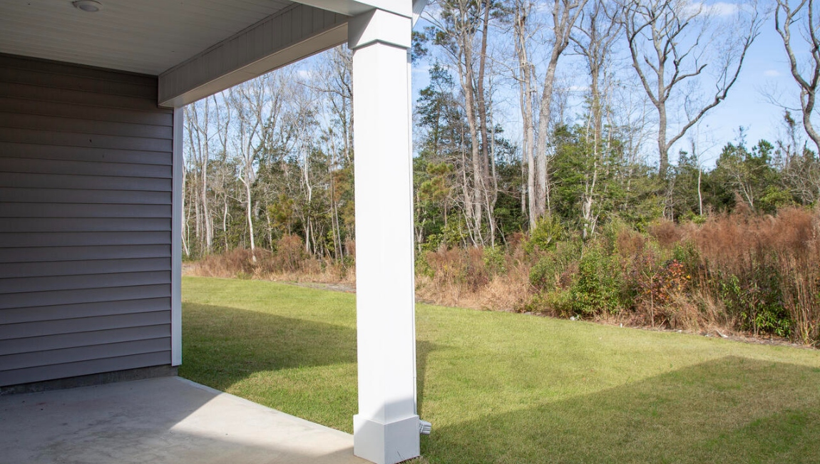 Enjoy the covered porch perfect for entertaining and enjoying the Carolina evenings.