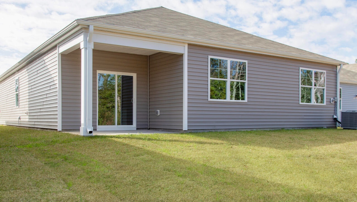 Enjoy the covered porch perfect for entertaining and enjoying the Carolina evenings.