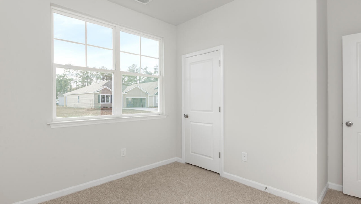 There are three additional bedrooms and full bath. In every bedroom you’ll have carpeted floors and a closet in each room.