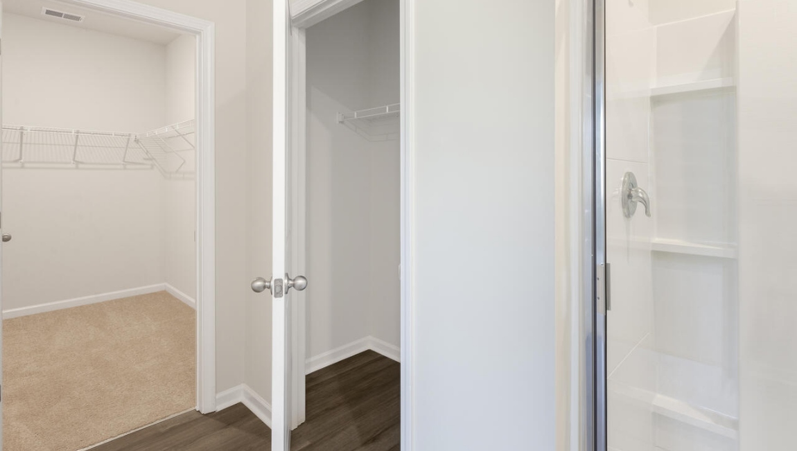 The primary bedroom has its own attached bathroom that features a walk-in closet and all the space you need to get ready in the morning.