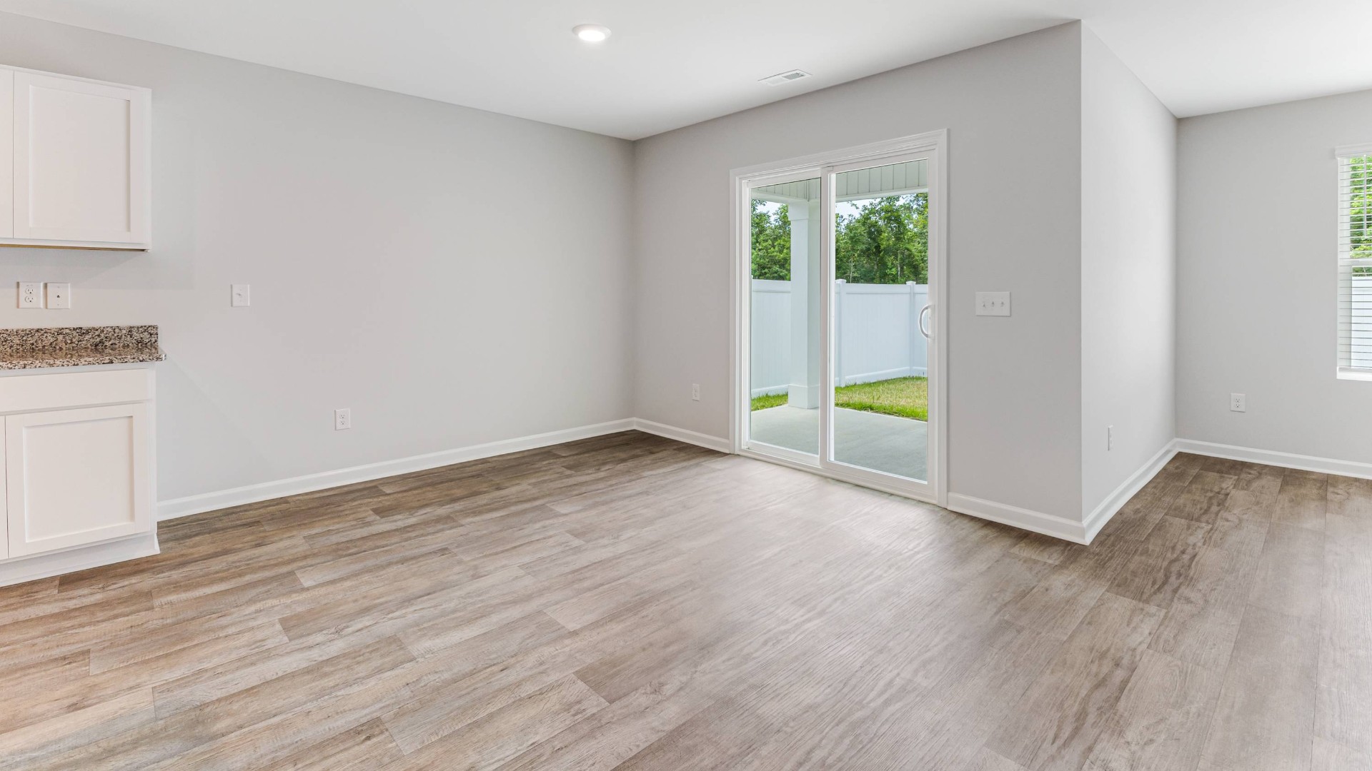 View of dining room with backdoor