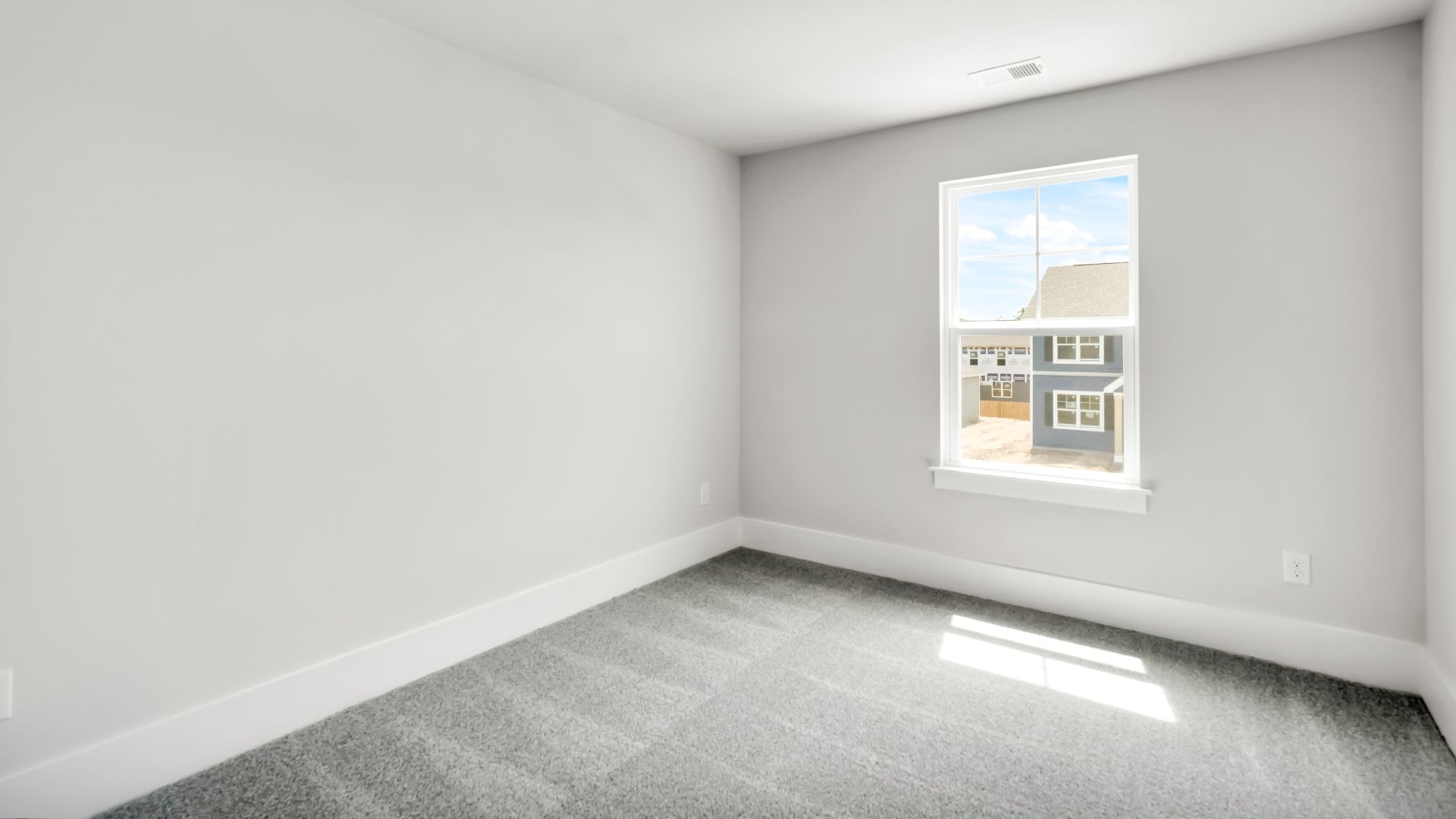 Upstairs this home also features a primary suite, complete with a large walk-in closet and en suite bathroom featuring dual vanities and a spacious shower. The additional three bedrooms share a full bath that includes dual vanities.