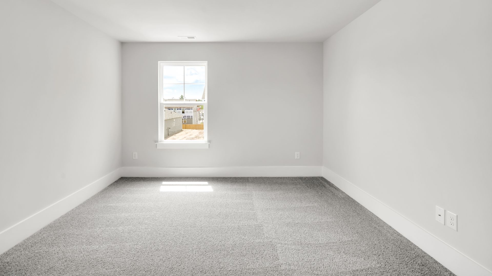 Upstairs this home also features a primary suite, complete with a large walk-in closet and en suite bathroom featuring dual vanities and a spacious shower. The additional three bedrooms share a full bath that includes dual vanities.