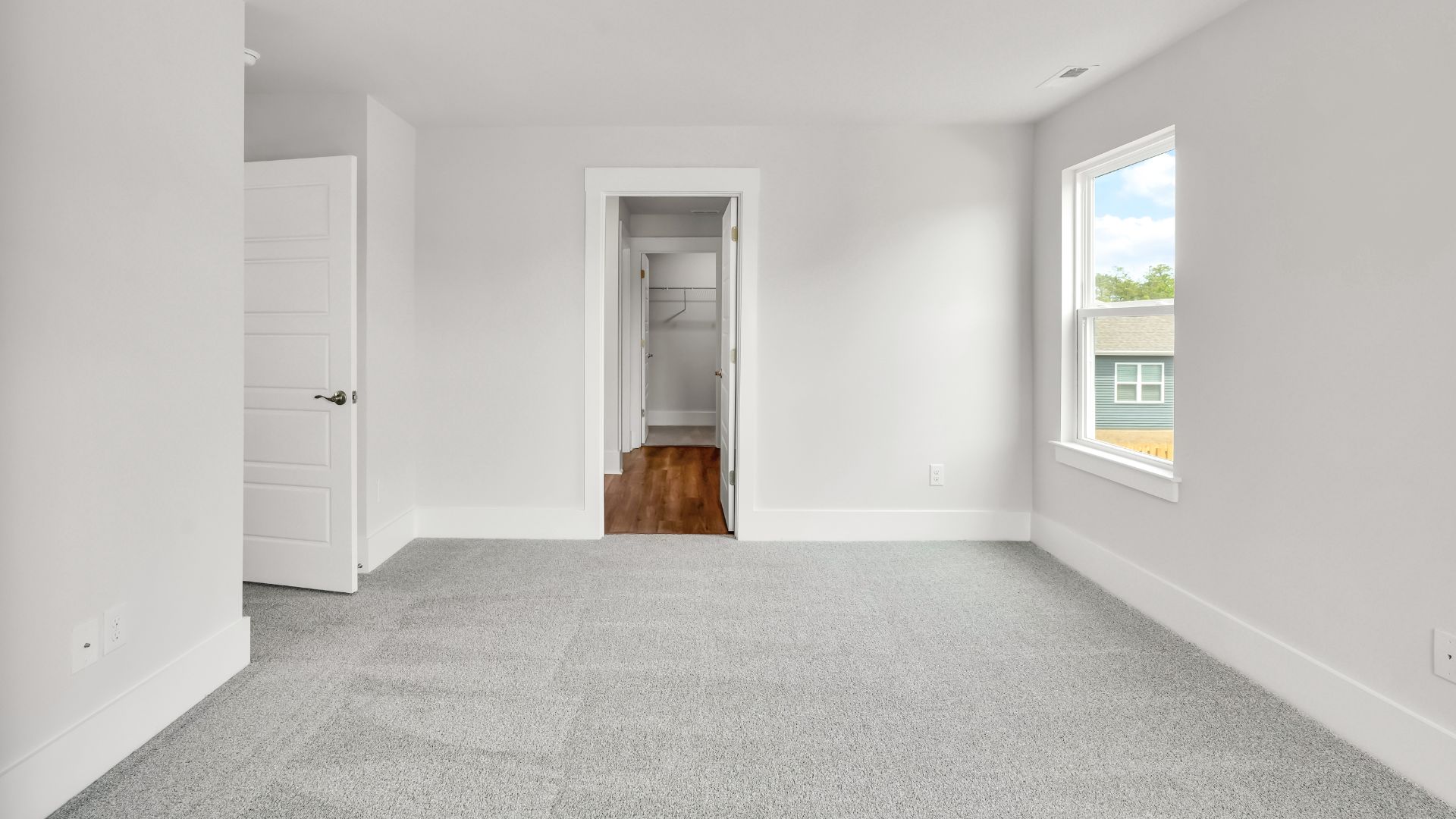 Upstairs this home also features a primary suite, complete with a large walk-in closet and en suite bathroom featuring dual vanities and a spacious shower. The additional three bedrooms share a full bath that includes dual vanities.