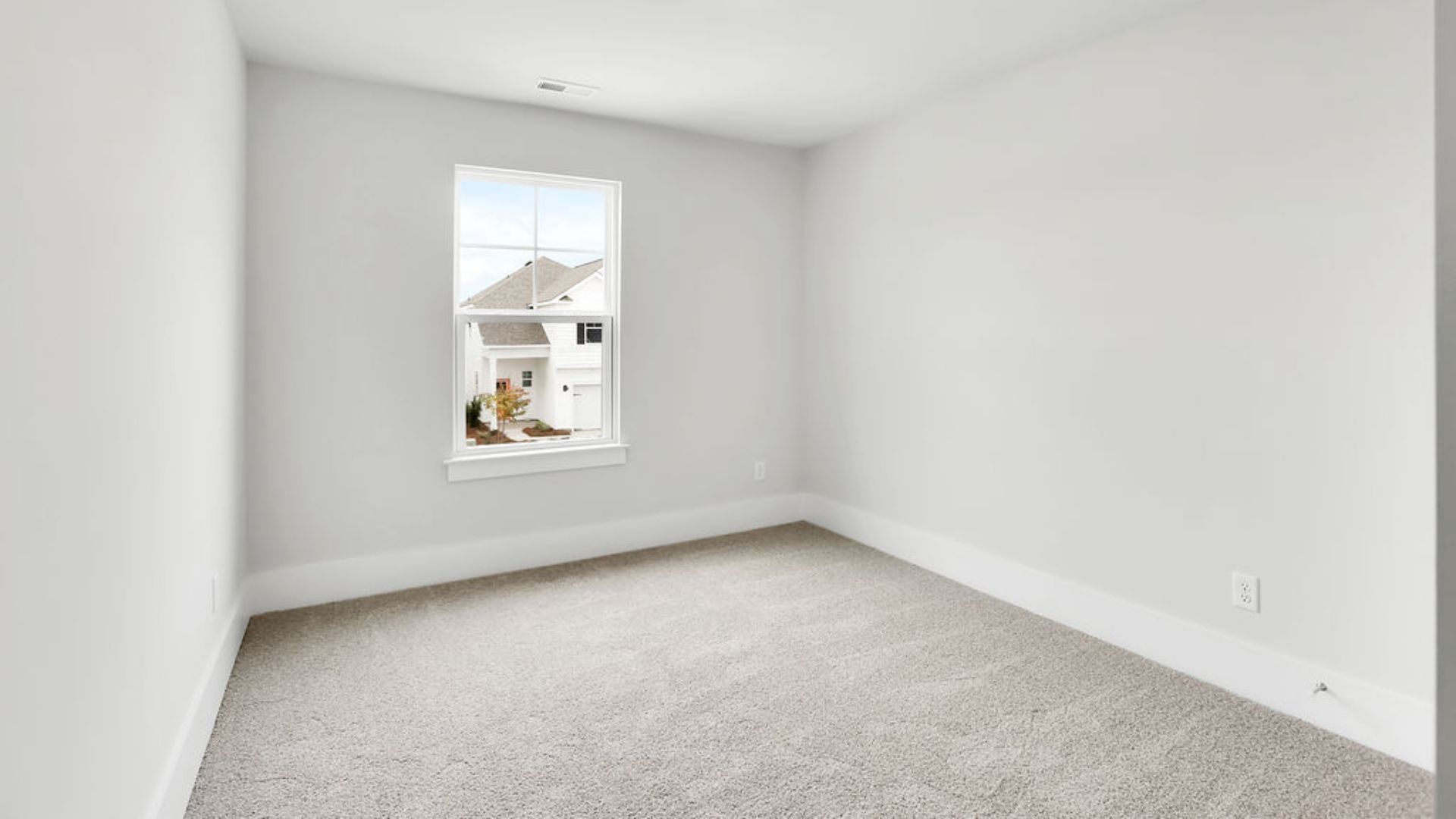 Upstairs this home also features a primary suite, complete with a large walk-in closet and en suite bathroom featuring dual vanities and a spacious shower. The additional three bedrooms share a full bath that includes dual vanities.