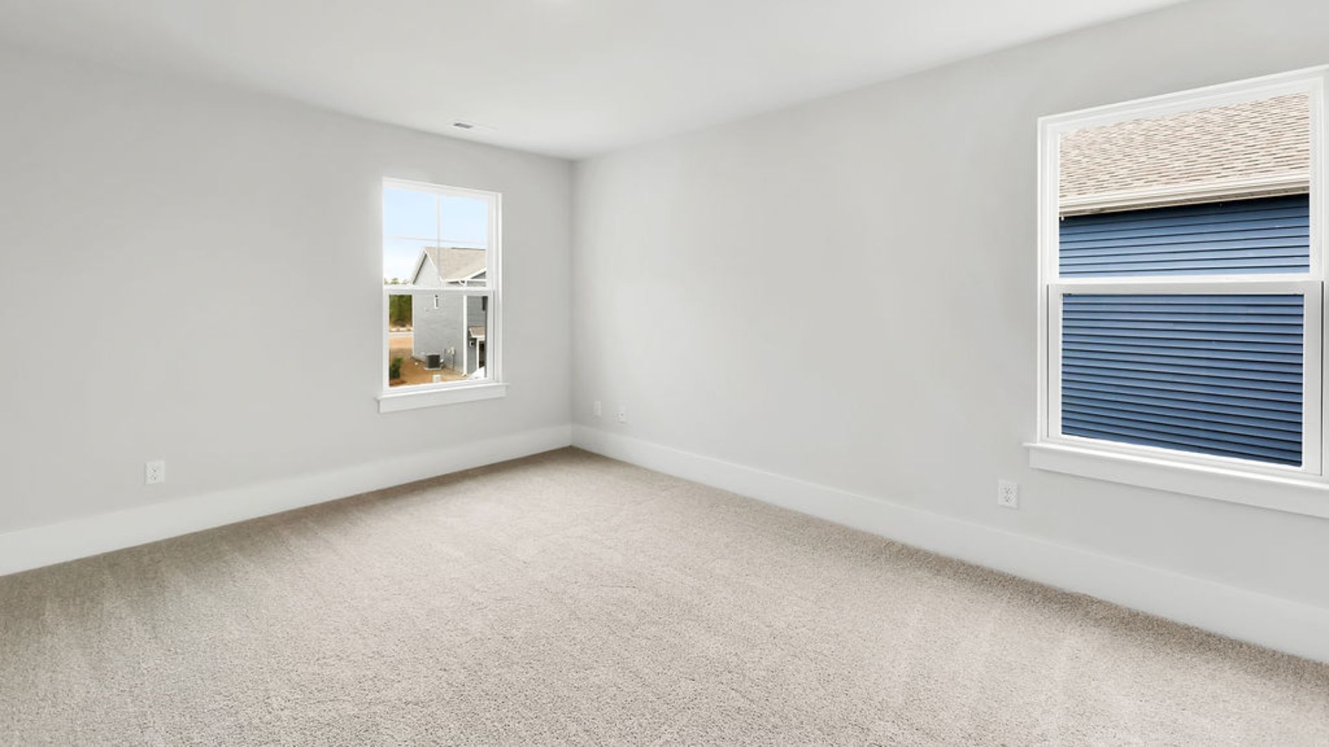 Upstairs this home also features a primary suite, complete with a large walk-in closet and en suite bathroom featuring dual vanities and a spacious shower. The additional three bedrooms share a full bath that includes dual vanities.