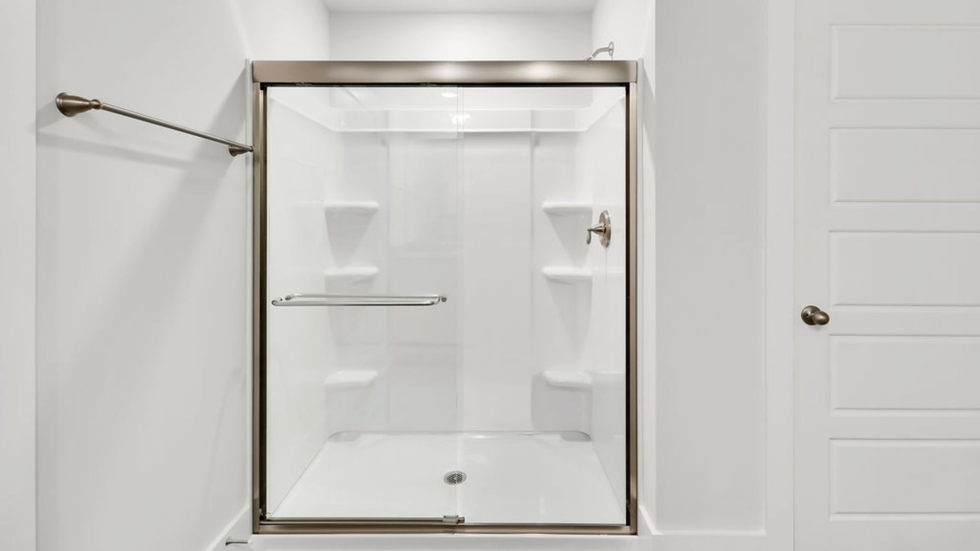 Upstairs this home also features a primary suite, complete with a large walk-in closet and en suite bathroom featuring dual vanities and a spacious shower. The additional three bedrooms share a full bath that includes dual vanities.