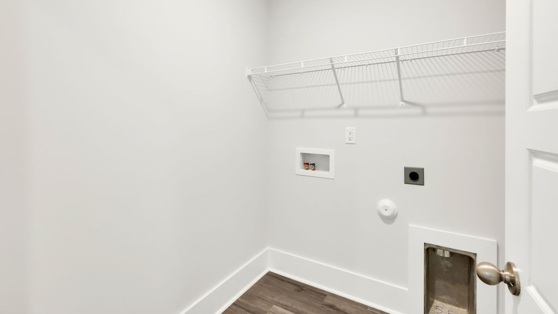 Upstairs this home also features a primary suite, complete with a large walk-in closet and en suite bathroom featuring dual vanities and a spacious shower. The additional three bedrooms share a full bath that includes dual vanities.