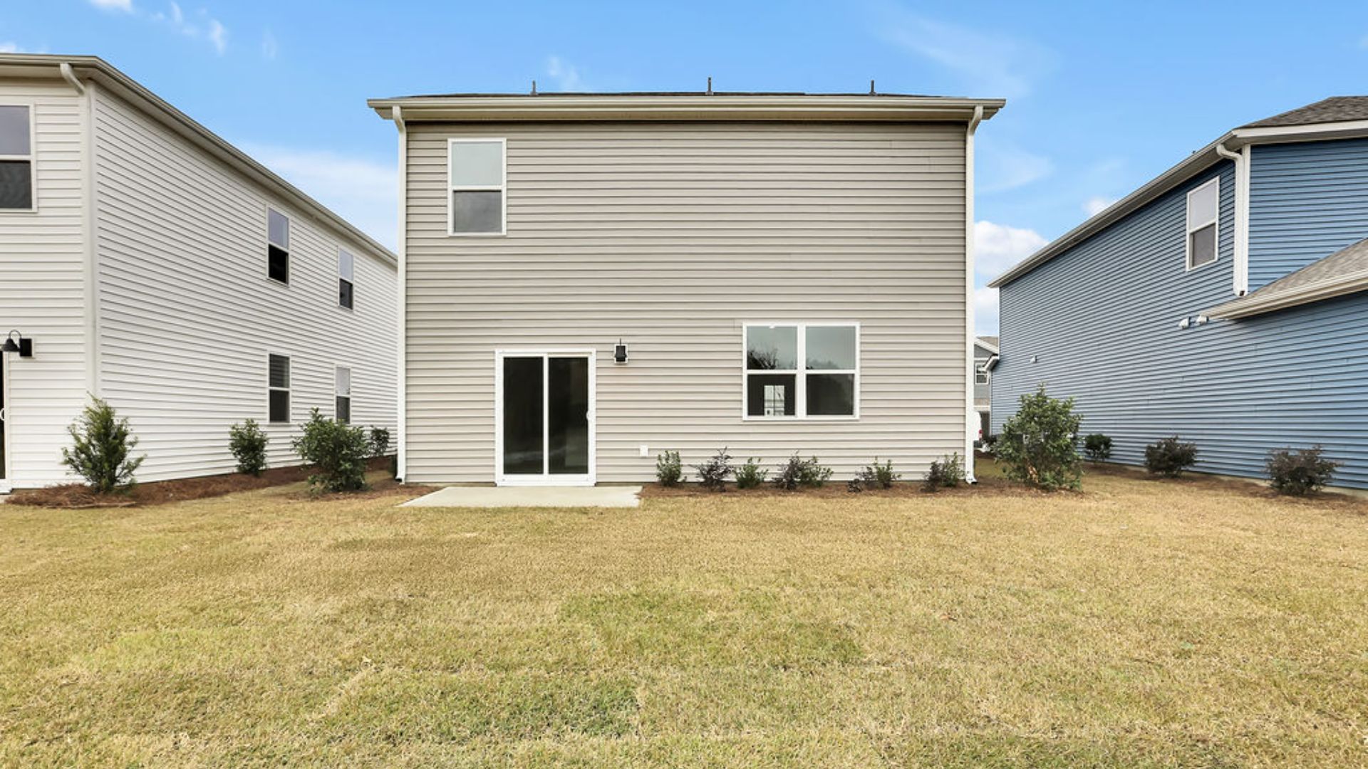 Out back is a patio, perfect for outdoor entertaining or enjoying beautiful weather.