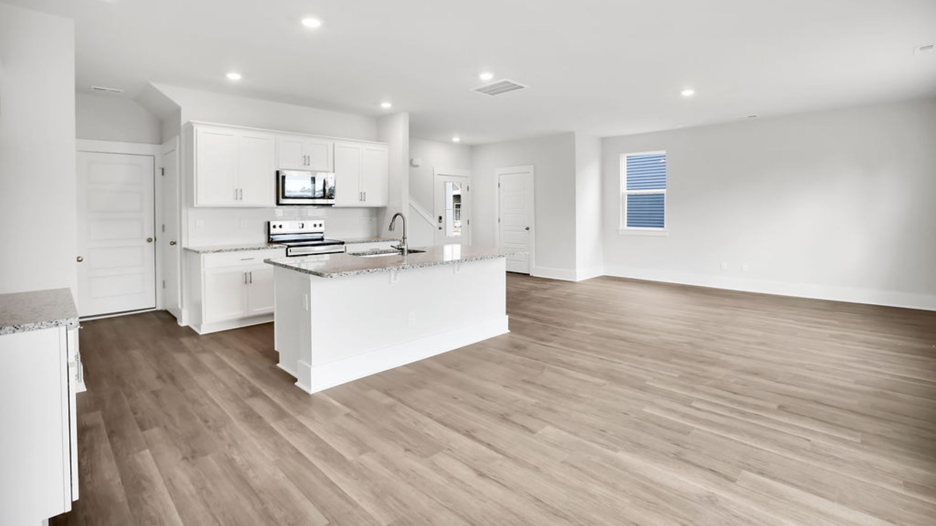 Upon entering the home, you'll be greeted by an inviting foyer that leads directly into the heart of the home.