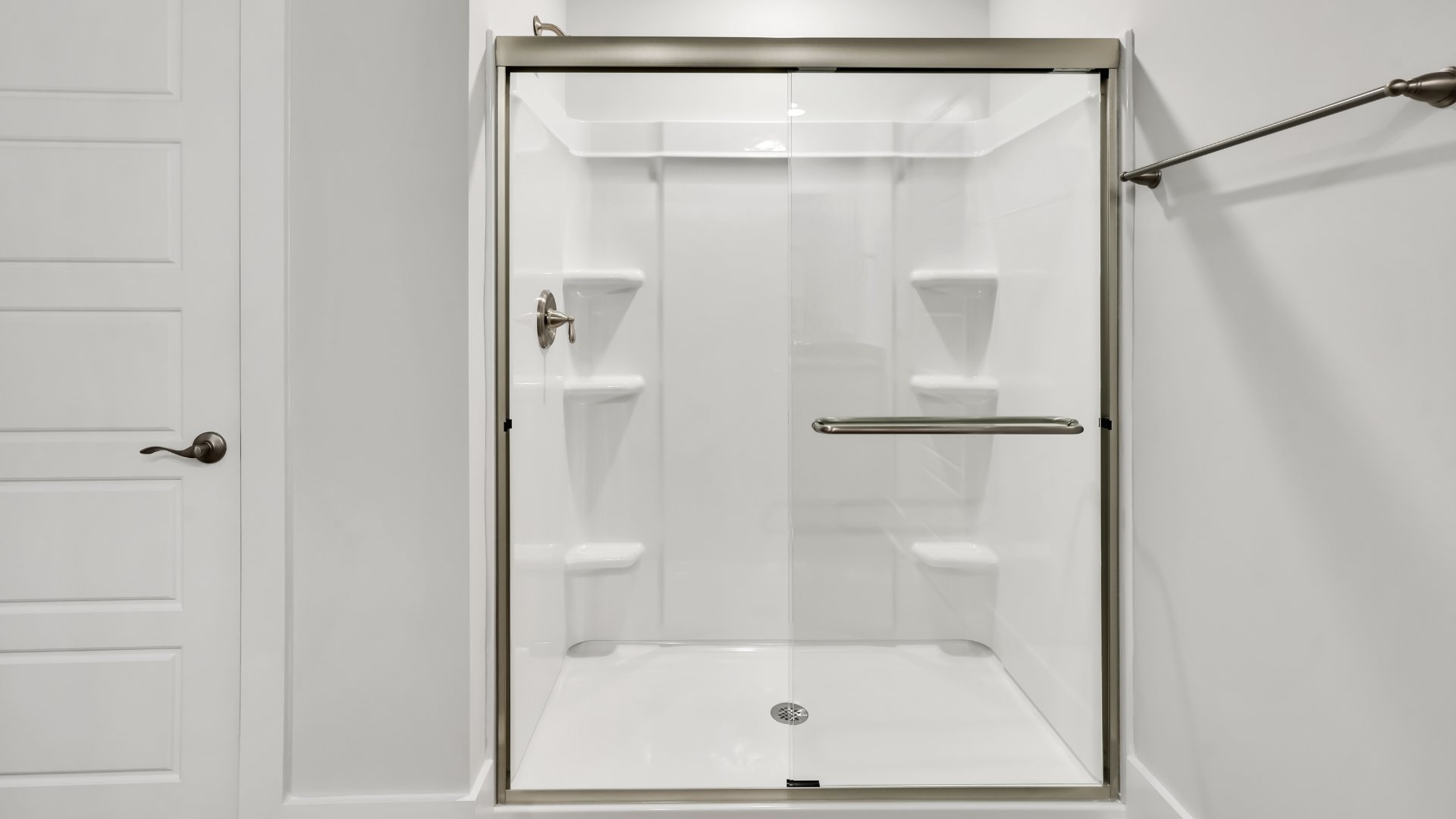 There are an additional three bedrooms, full bath and laundry room.