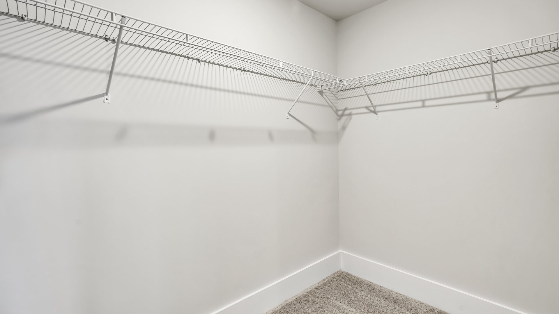 There are an additional three bedrooms, full bath and laundry room.