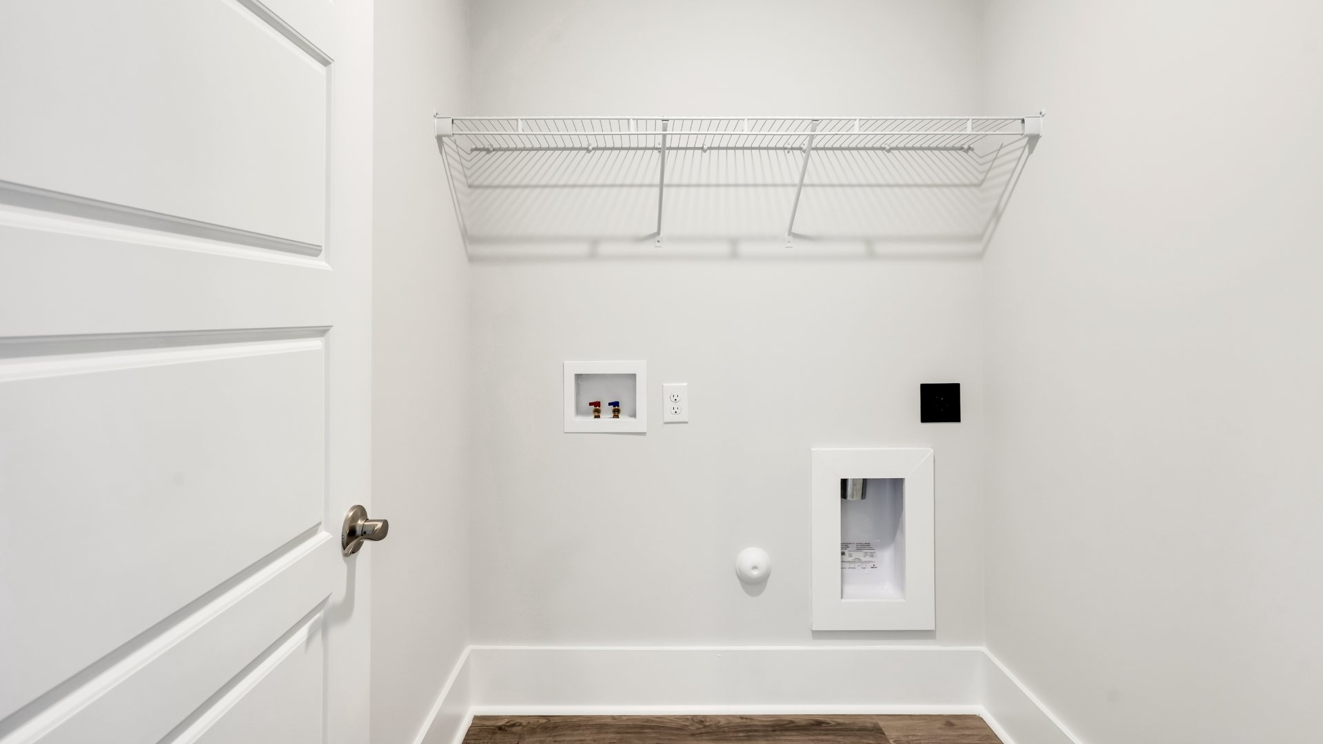 There are an additional three bedrooms, full bath and laundry room.