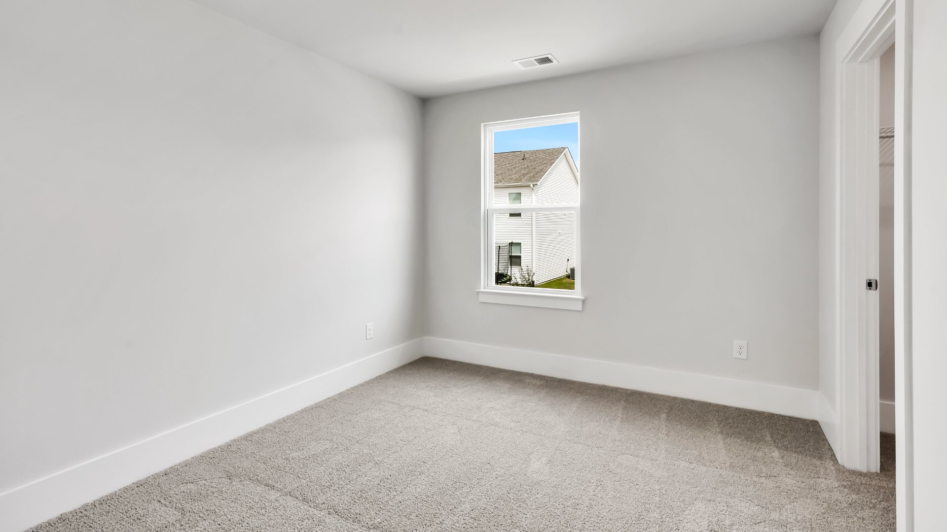 There are an additional three bedrooms, full bath and laundry room.