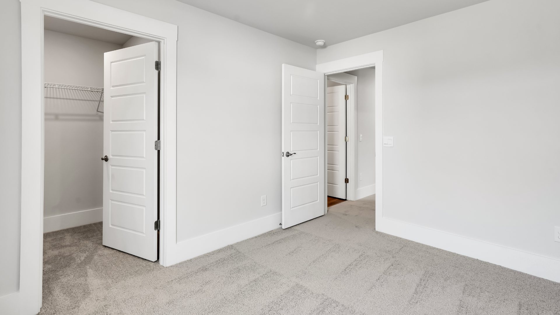 There are an additional three bedrooms, full bath and laundry room.