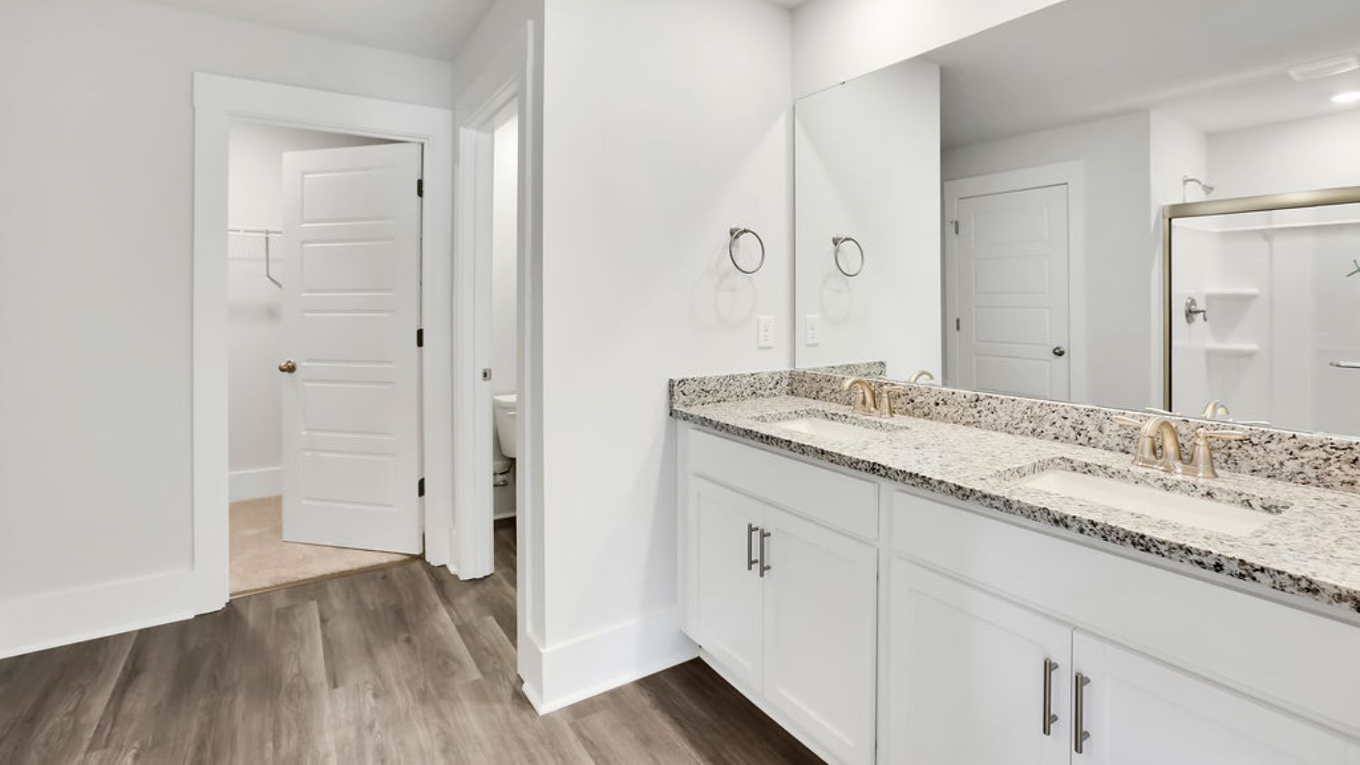 Upstairs you will find the primary bedroom has its own attached bathroom that features a walk-in closet and all the space you need to get ready in the morning.