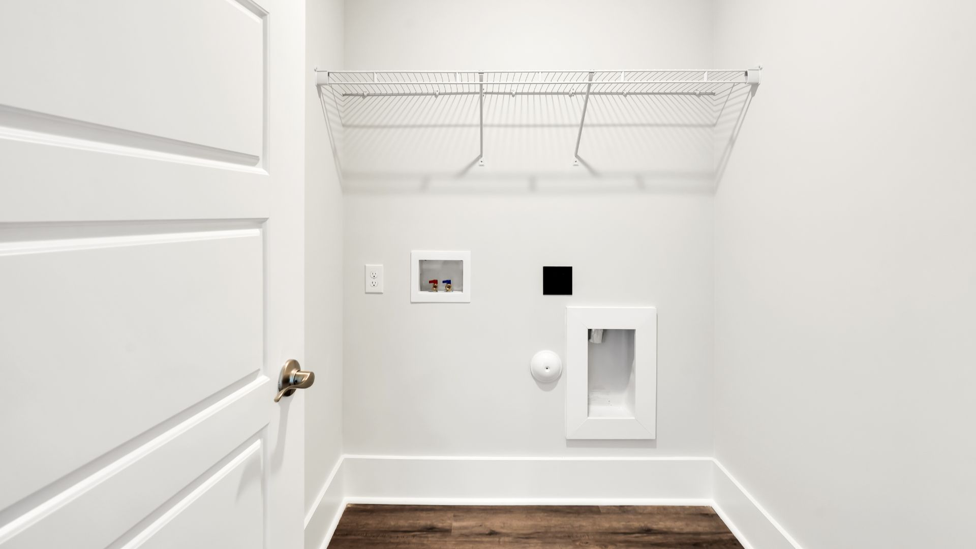 Upstairs this home also features a primary suite, complete with a large walk-in closet and en suite bathroom featuring dual vanities and a spacious shower. The additional three bedrooms share a full bath that includes dual vanities.