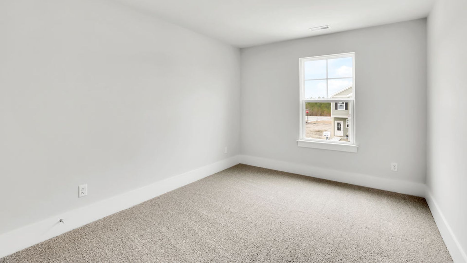 This new home will feature 9 ft. ceilings, beautiful quartz kitchen countertops, granite countertops in the two full bathrooms, luxury vinyl plank flooring