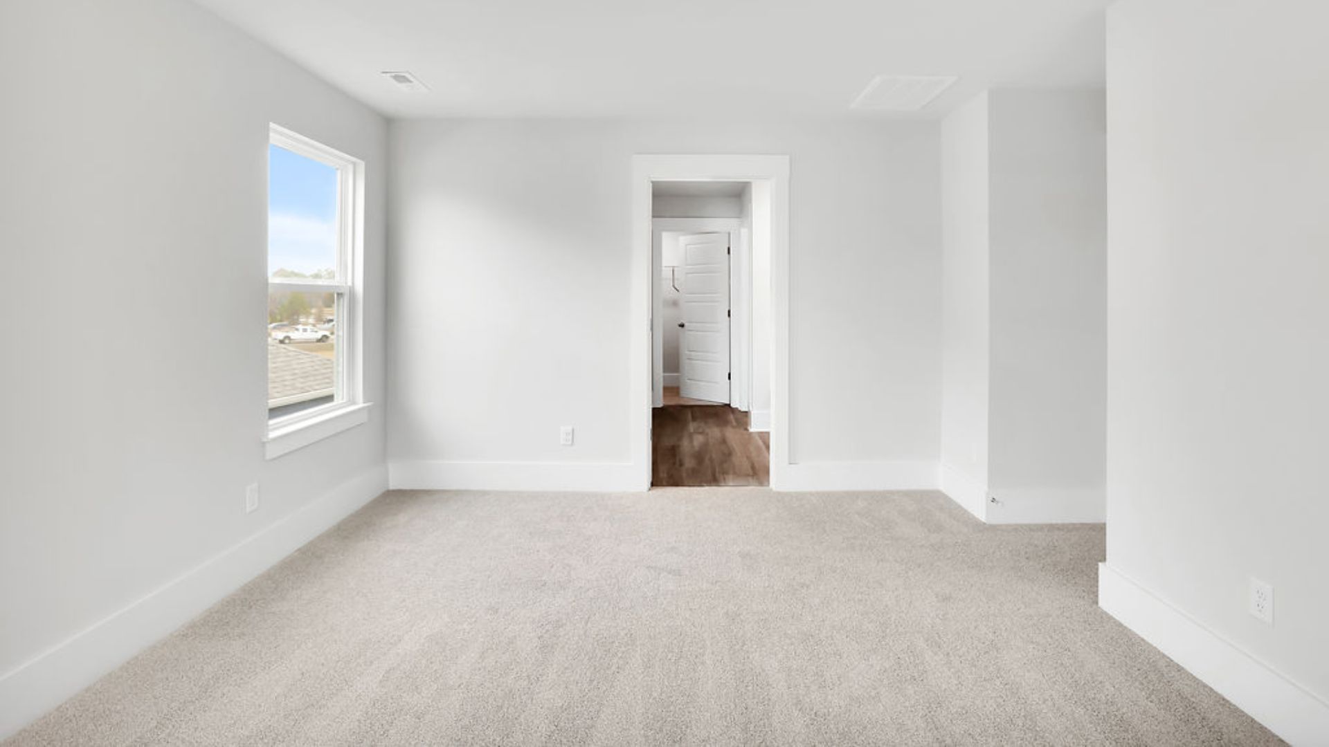 This new home will feature 9 ft. ceilings, beautiful quartz kitchen countertops, granite countertops in the two full bathrooms, luxury vinyl plank flooring