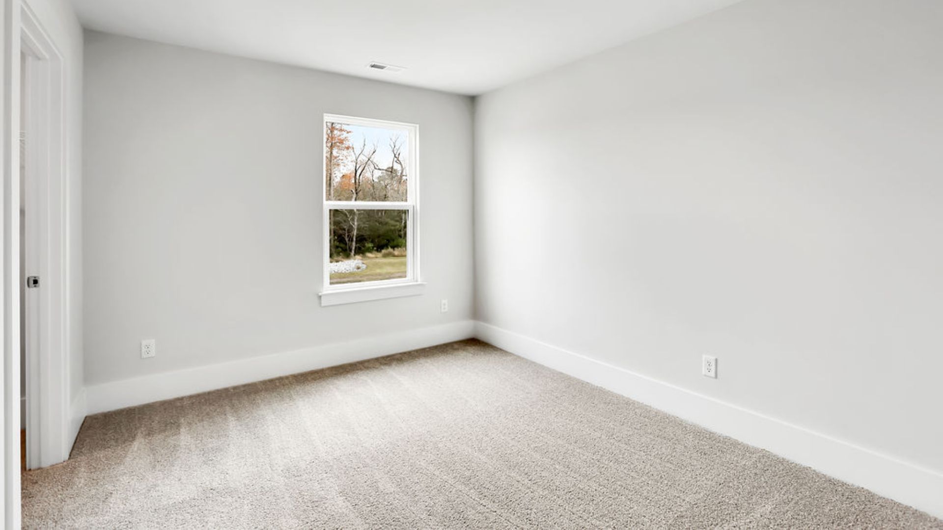 This new home will feature 9 ft. ceilings, beautiful quartz kitchen countertops, granite countertops in the two full bathrooms, luxury vinyl plank flooring