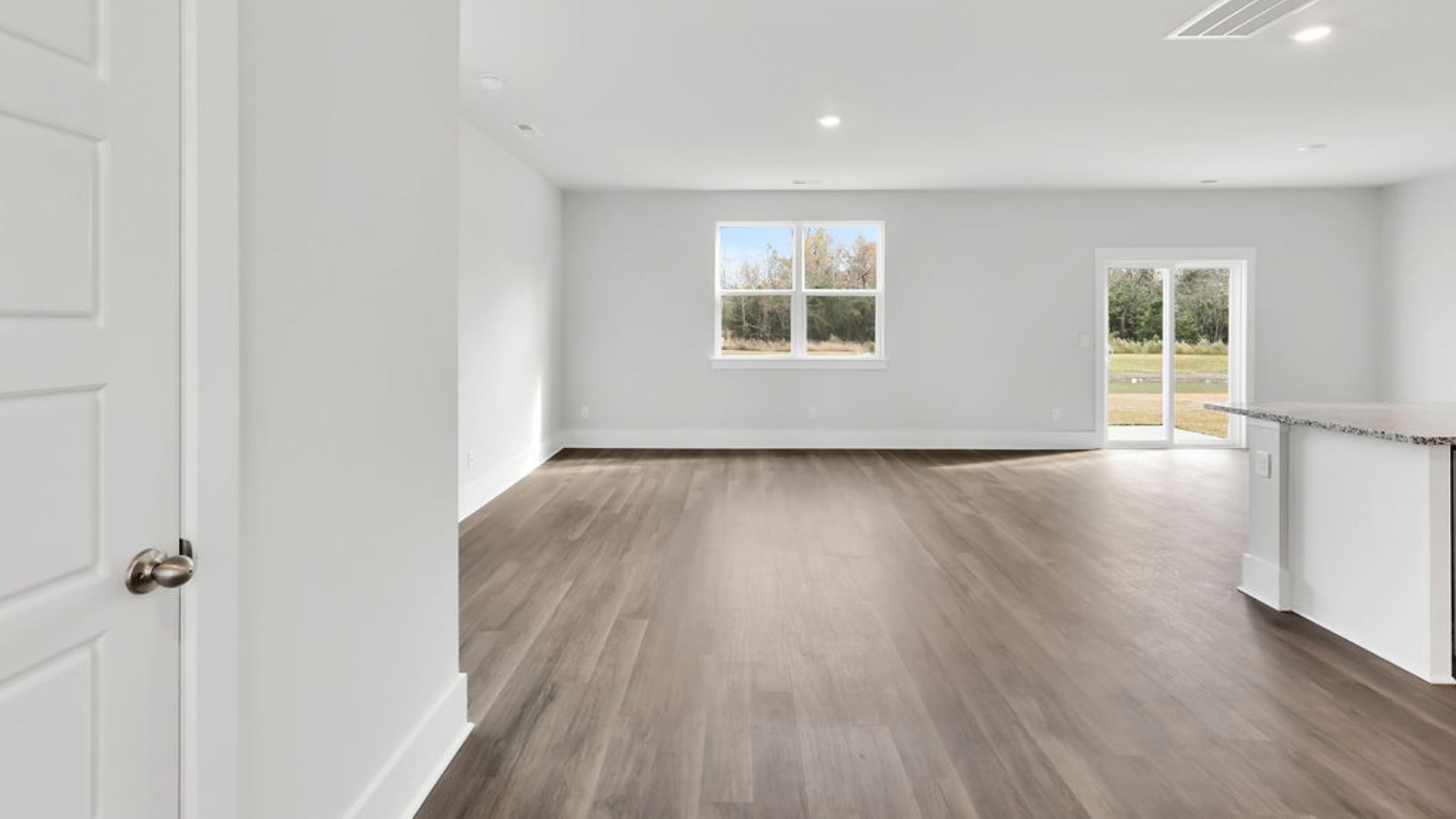 This new home will feature 9 ft. ceilings, beautiful quartz kitchen countertops, granite countertops in the two full bathrooms, luxury vinyl plank flooring, a cozy Patio.