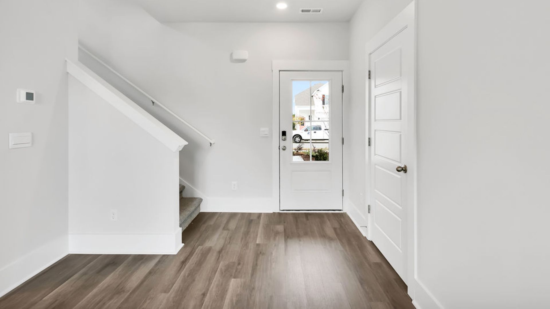 This new home will feature 9 ft. ceilings, beautiful quartz kitchen countertops, granite countertops in the two full bathrooms, luxury vinyl plank flooring, a cozy Patio.