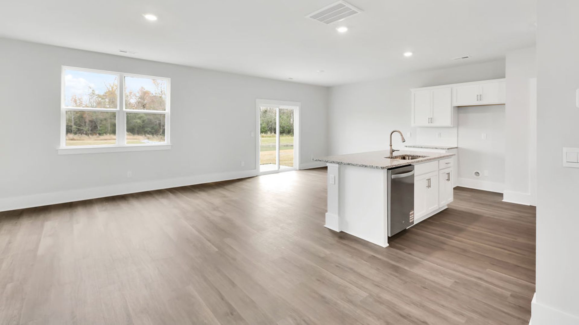 This new home will feature 9 ft. ceilings, beautiful quartz kitchen countertops, granite countertops in the two full bathrooms, luxury vinyl plank flooring, a cozy Patio.