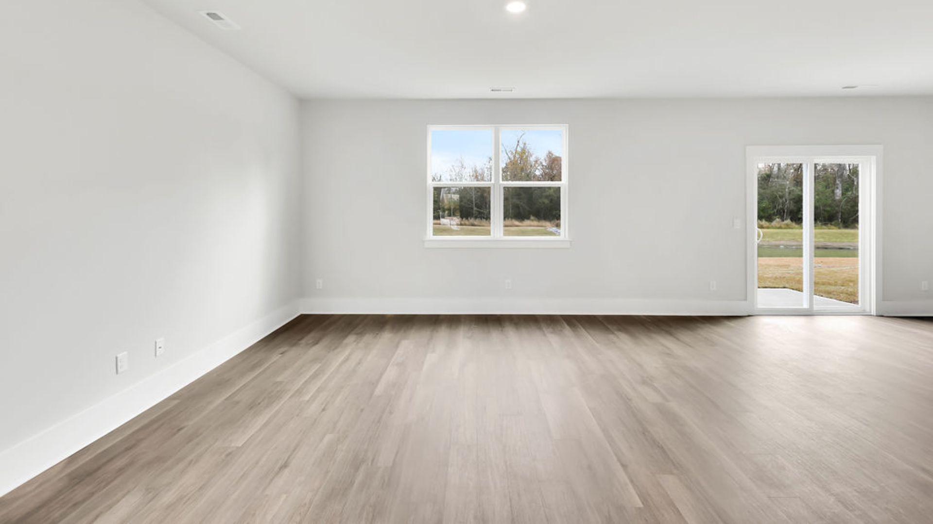 This new home will feature 9 ft. ceilings, beautiful quartz kitchen countertops, granite countertops in the two full bathrooms, luxury vinyl plank flooring, a cozy Patio.